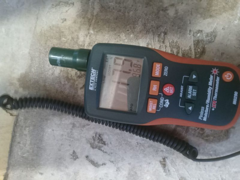 Extech MO290 pinless moisture meter measuring concrete slab moisture