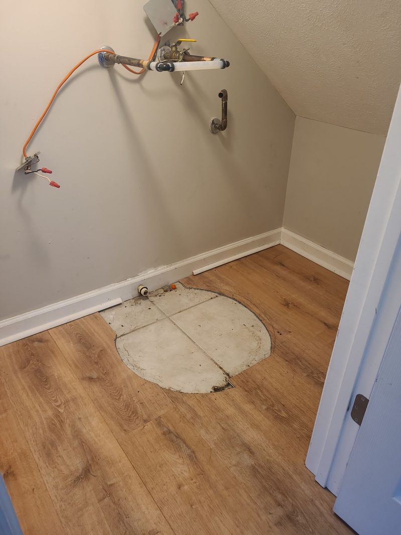 New luxury vinyl plank flooring installed after water damage restoration